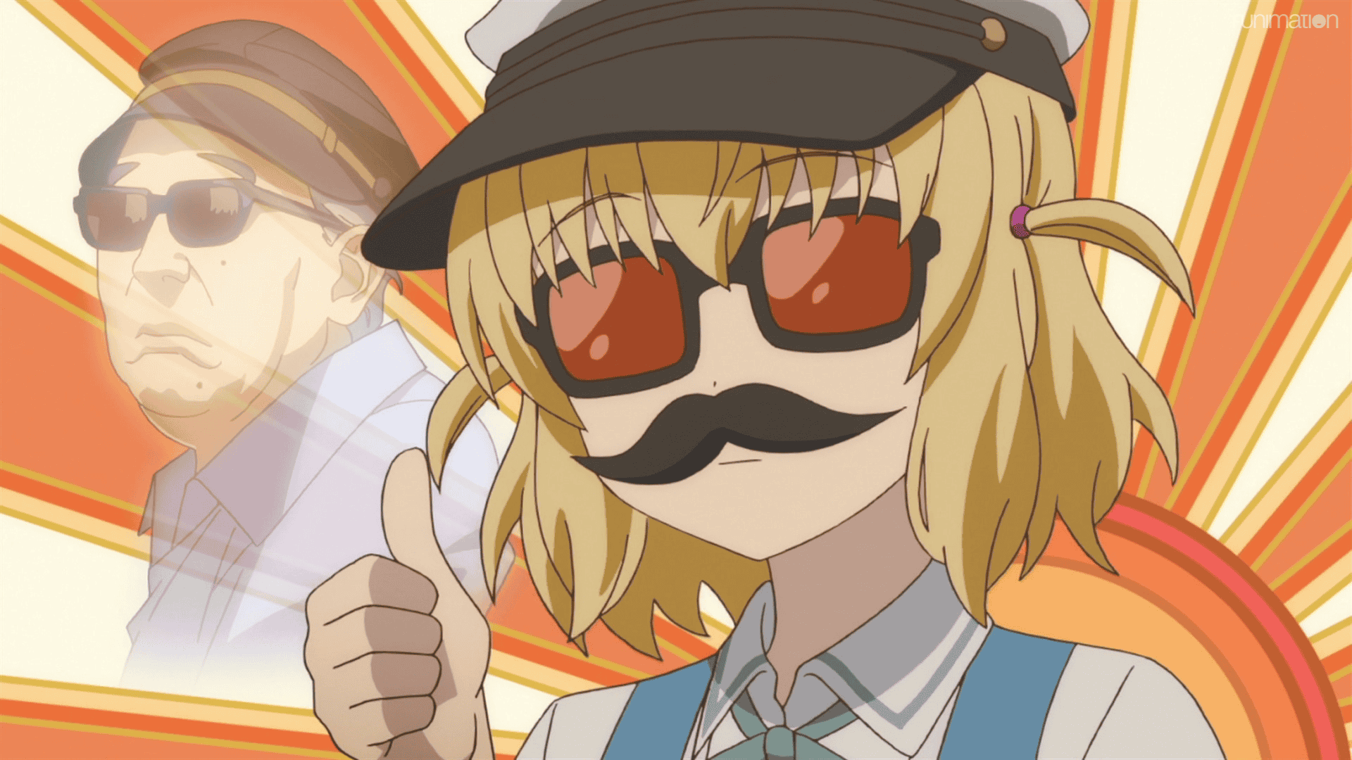 Roka Shibasaki memakai kumis palsu, kacamata hitam, dan topi dalam perannya sebagai sutradara untuk pertunjukan festival budaya dalam sebuah adegan dari D-Frag! Anime TV.